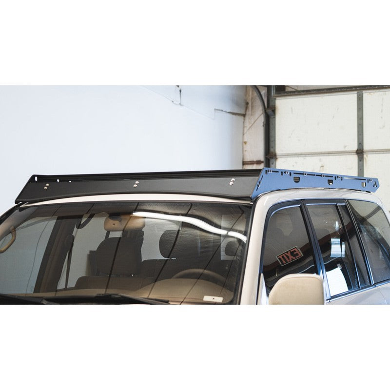 sherpa-oxford-1998-2007-lc100-lx470-roof-rack-front-corner-view-in-garrage