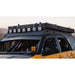 sherpa-princeton-2003-2009-4runner-roof-rack-roof-rack-front-corner-view-on-yellow-toyota-4runner-in-nature