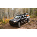 sherpa-rack-height-pak-system-bed-front-corner-view-on-tacoma-in-nature