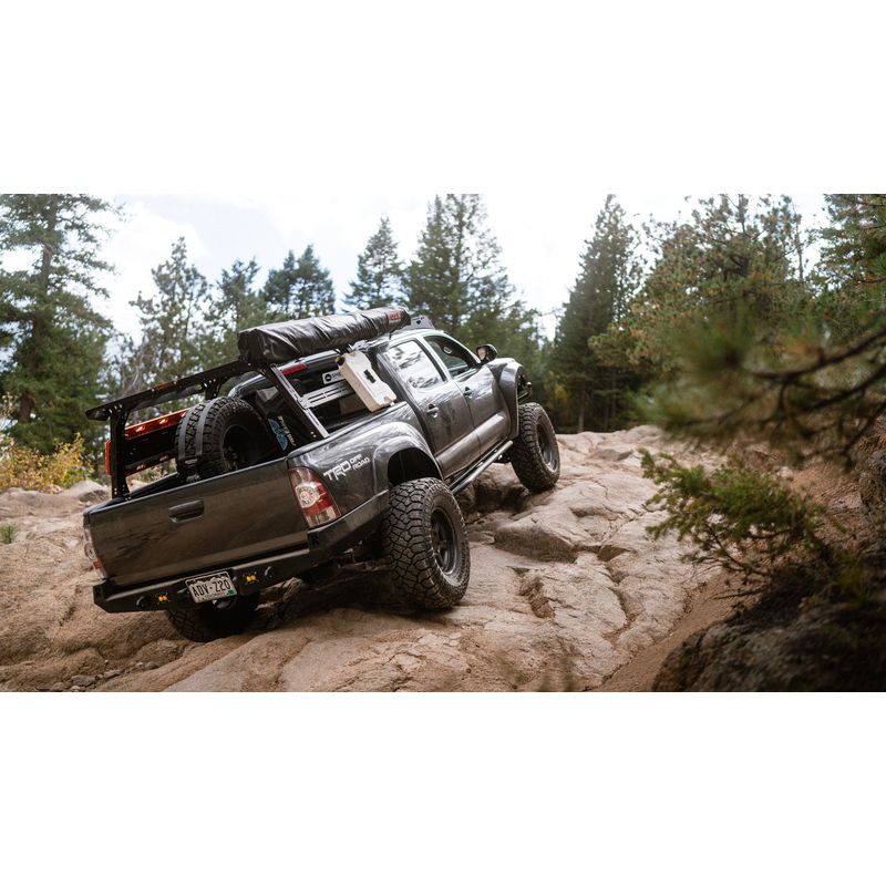 sherpa-rack-height-pak-system-bed-rack-rear-view-on-tacoma-in-nature