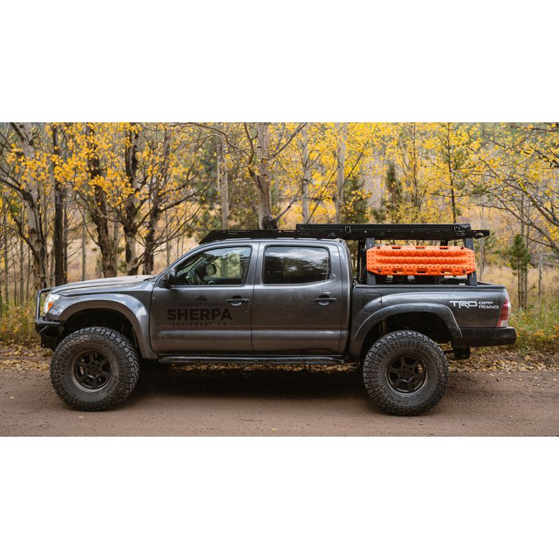 sherpa-rack-height-pak-system-bed-side-view-on-toyota-tacoma-in-nature