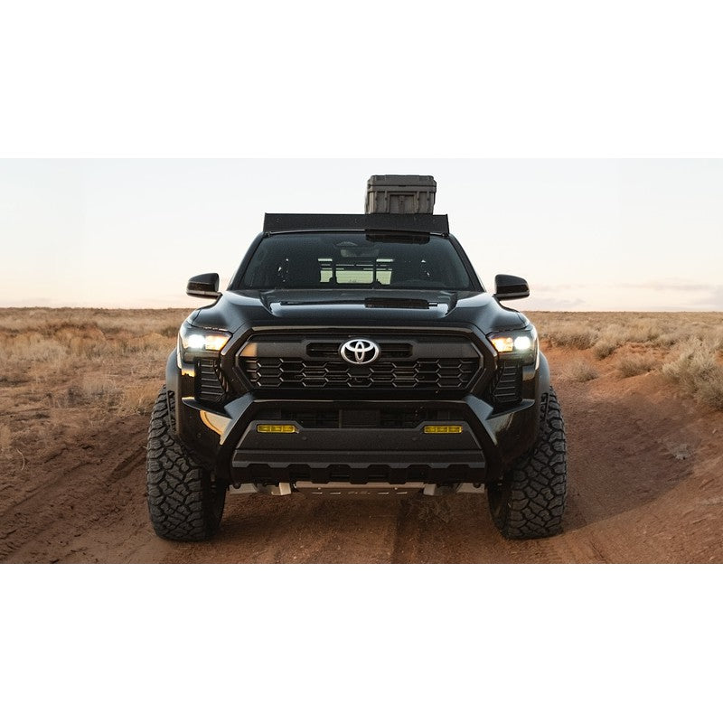 sherpa-rainier-roof-rack-for-2024-tacoma-double-cab-front-view-with-roam-case-in-terrain