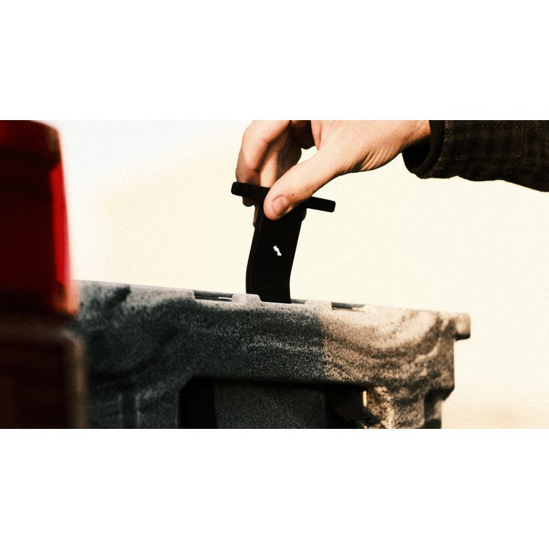 sherpa-roam-case-and-cooler-tie-downs-close-up-view-with-hand-holding-tie-down