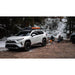 sherpa-snowmass-roof-rack-for-2019-2024-rav4-front-corner-view-with-persons-on-background-in-nature