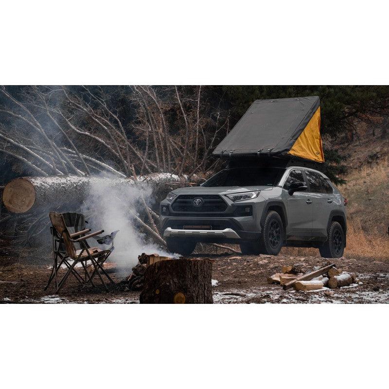 sherpa-snowmass-roof-rack-for-2019-2024-rav4-front-corner-view-with-roof-top-tent-in-nature