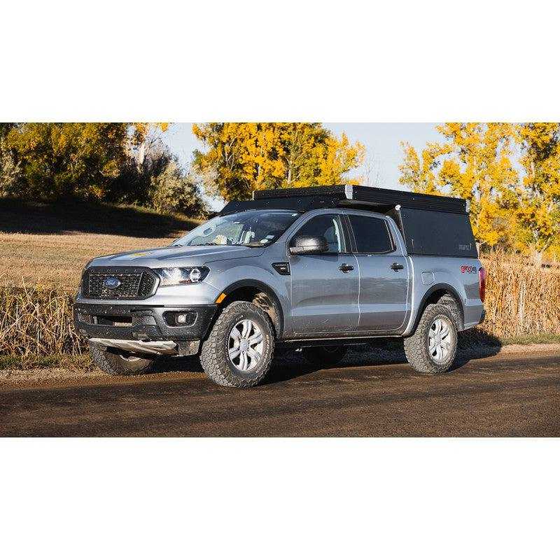 sherpa-stratus-roof-rack-for-2019-2023-ranger-camper-front-corner-view-in-nature