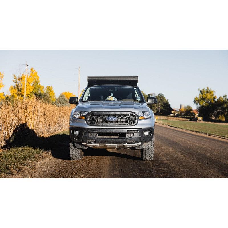 sherpa-stratus-roof-rack-for-2019-2023-ranger-camper-front-view-in-nature