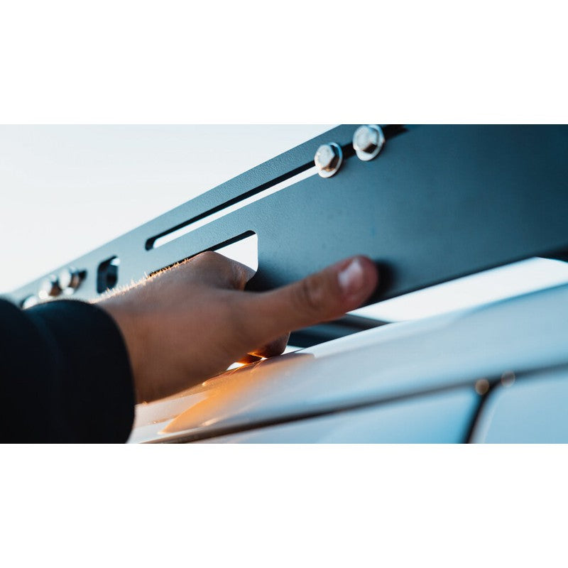 sherpa-teton-2005-2023-tacoma-access-cab-roof-rack-close-up-view-with-person-on-white-tacoma