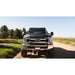 sherpa-thunder-roof-rack-for-2017-2024-ford-f250-f350-front-view-with-grass-field-on-background