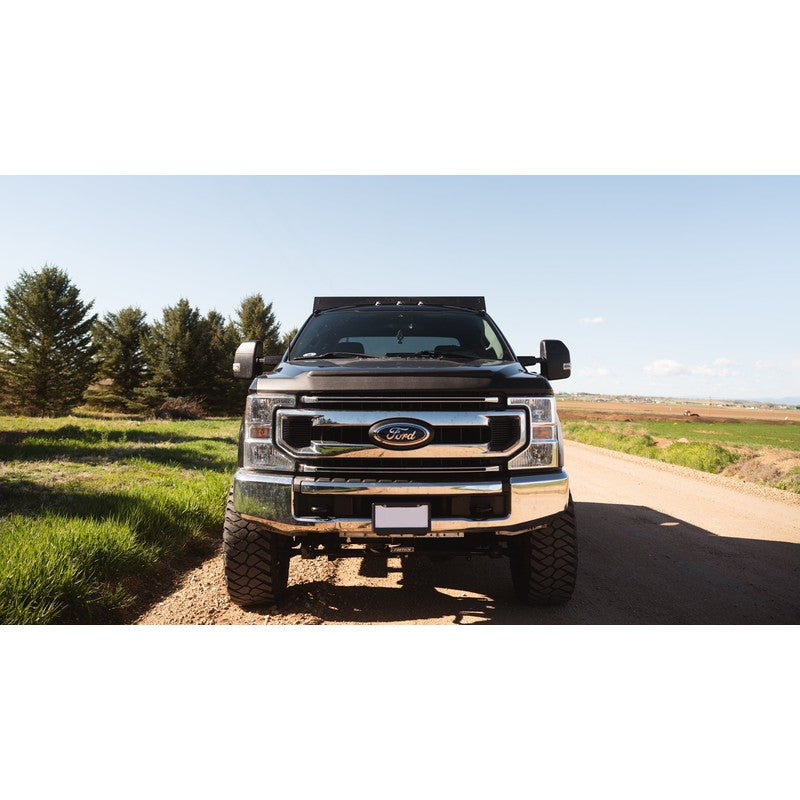 sherpa-thunder-roof-rack-for-2017-2024-ford-f250-f350-front-view-with-grass-field-on-background