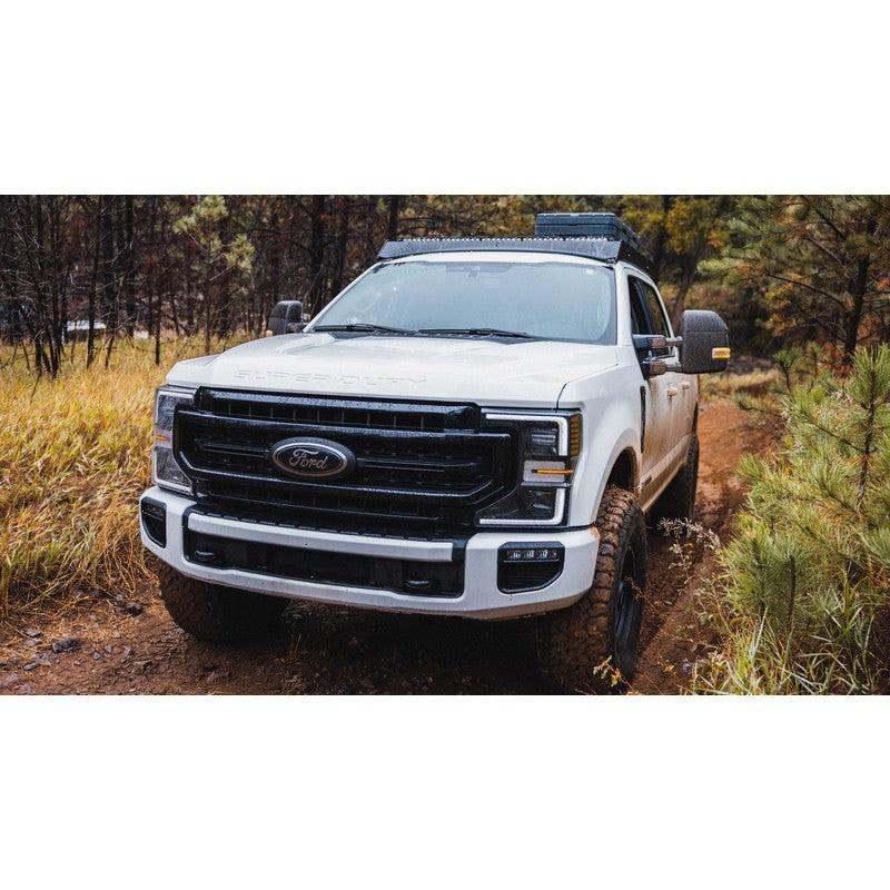 sherpa-thunder-roof-rack-for-2017-2024-ford-f250-f350-front-view-with-roam-case-in-forest