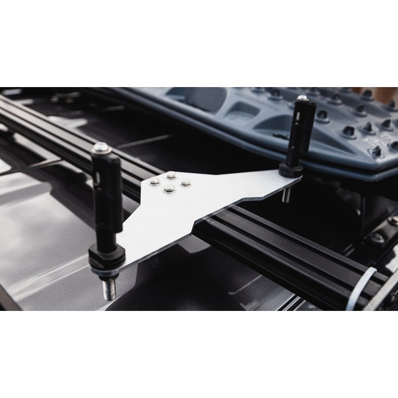 sherpa-traction-board-mounts-front-corner-view-with-bolts-on-vehicle