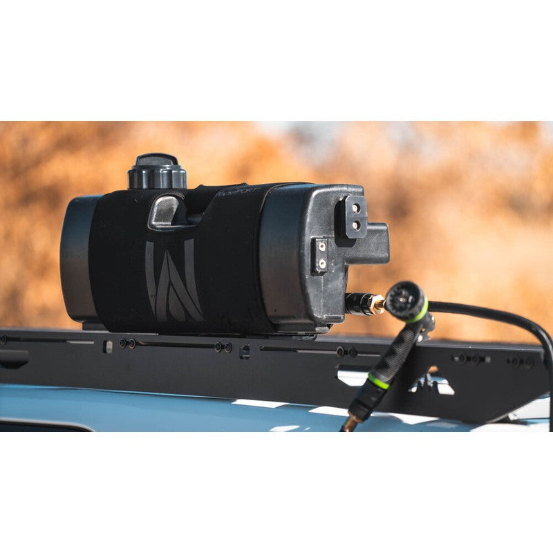 sherpa-waterport-mount-front-corner-view-on-vehicle-in-nature