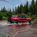 sherpa-window-panel-for-toyota-4runner-4th-gen-front-view-with-vehicle-crossing-waters-in-nature