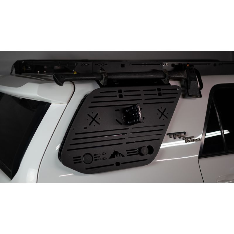 sherpa-window-panel-for-toyota-4runner-5th-gen-front-view-with-axe-on-vehicle