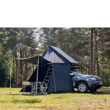 tentbox-cargo-2-living-pod-wing-mode-front-corner-view-on-dacia-duster-with-ladder-in-nature