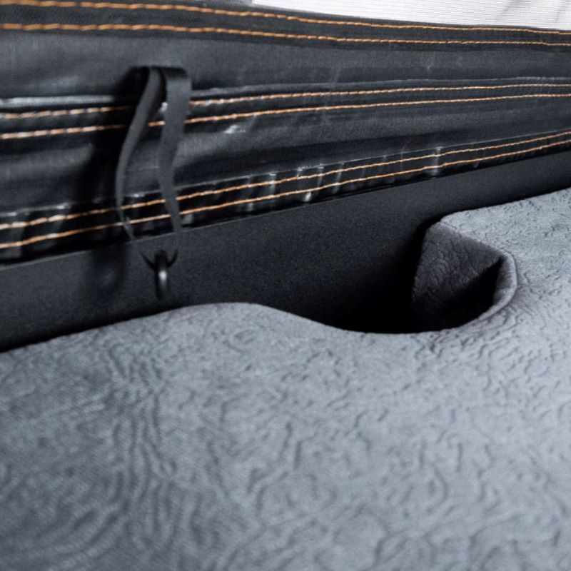 tentbox-cargo-hard-shell-roof-top-tent-black-open-close-up-view-with-mattress-on-white-background