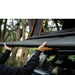 tentbox-cargo-side-awning-closed-close-up-view-on-vehicle-with-person-holding-the-awning-in-nature
