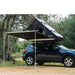 tentbox-cargo-side-awning-open-front-corner-view-on-nissan-qashqai-with-tentbox-cargo-in-nature