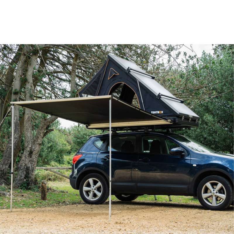 tentbox-cargo-side-awning-open-front-corner-view-on-nissan-qashqai-with-tentbox-cargo-in-nature