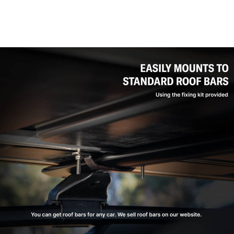 tentbox-classic-2-hard-shell-roof-top-tent-close-up-view-with-roof-bars-in-nature