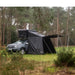 tentbox-classic-2-living-pod-wing-mode-side-view-on-dacia-duster-in-nature