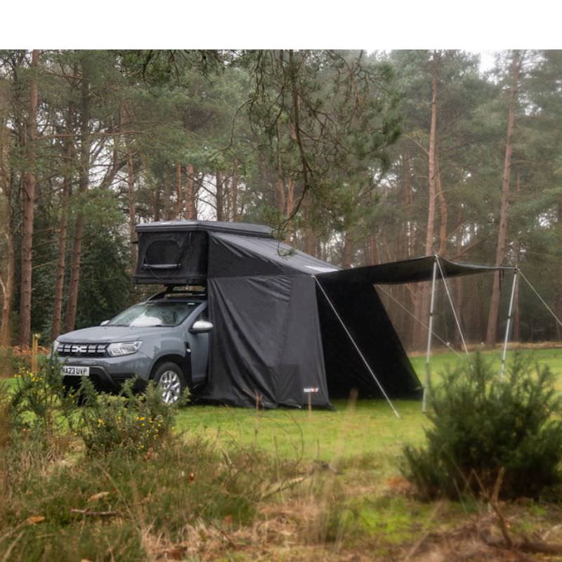 tentbox-classic-2-living-pod-wing-mode-side-view-on-dacia-duster-in-nature