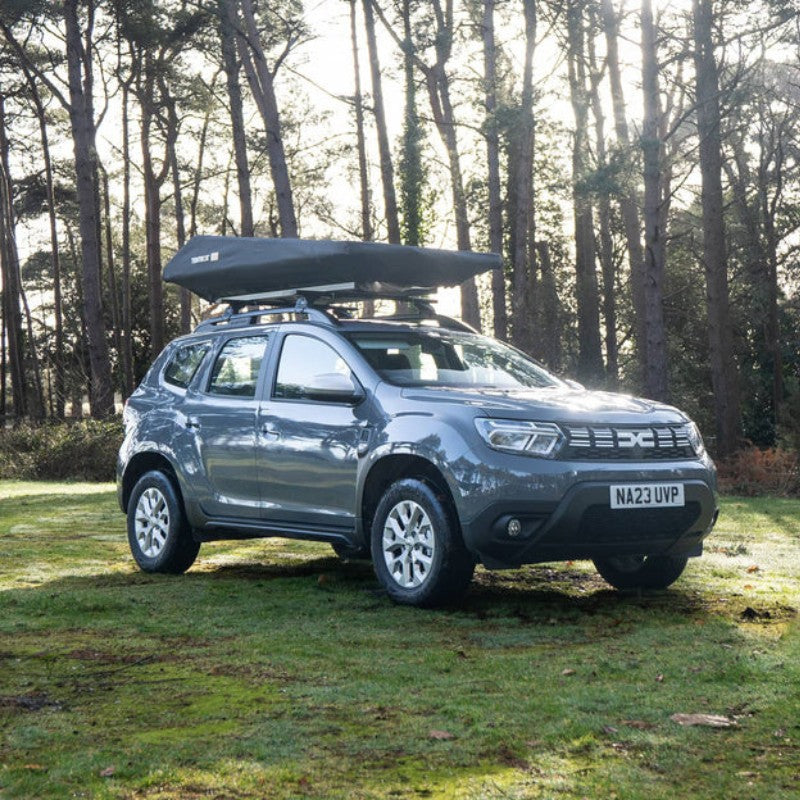 tentbox-go-hybrid-roof-top-tent-black-closed-side-view-on-vehicle-in-nature