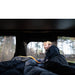  Analyzing image     tentbox-go-hybrid-roof-top-tent-black-open-interiror-view-with-man-and-window-mesh-closed-in-nature