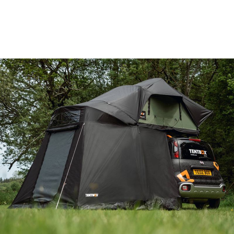 tentbox-lite-2-living-pod-black-open-side-view-on-fiat-panda-cross-in-nature