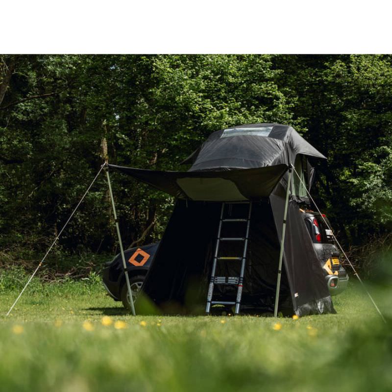 tentbox-lite-2-living-pod-black-wing-mode-open-front-corner-view-with-telescopic-poles-on-fiat-panda-cross-in-nature