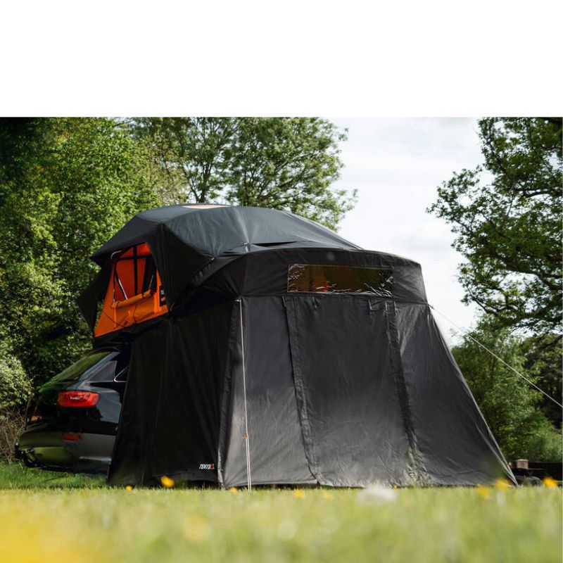 tentbox-lite-xl-living-pod-black-open-front-corner-view-on-vehicle-in-nature