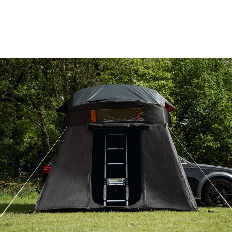 tentbox-lite-xl-living-pod-black-open-front-view-with-ladder-on-vehicle-in-nature