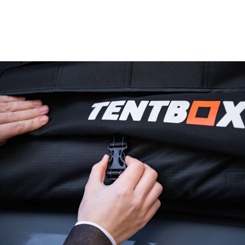 tentbox-universal-side-awning-close-close-up-view-with-hand-holding-buckle