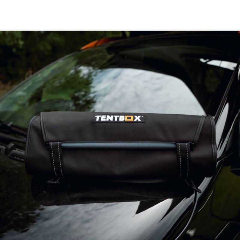 tentbox-utility-pockets-slate-gray-closed-front-view-on-top-of-vehicle-in-nature