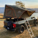 tuff-stuff-alpha-hard-shell-roof-top-tent-2-3-person-gray-open-with-ladder-on-vehicle