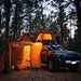 tuff-stuff-alpha-hard-shell-roof-top-tent-2-3-person-with-annex-open-side-view-on-toyota-4runner-in-nature