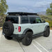 badass-tents-recon-pop-up-roof-top-tent-closed-rear-side-view-on-ford-bronco