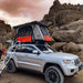 badass-tents-recon-pop-up-roof-top-tent-open-front-corner-view-on-jeep-grand-cherokee