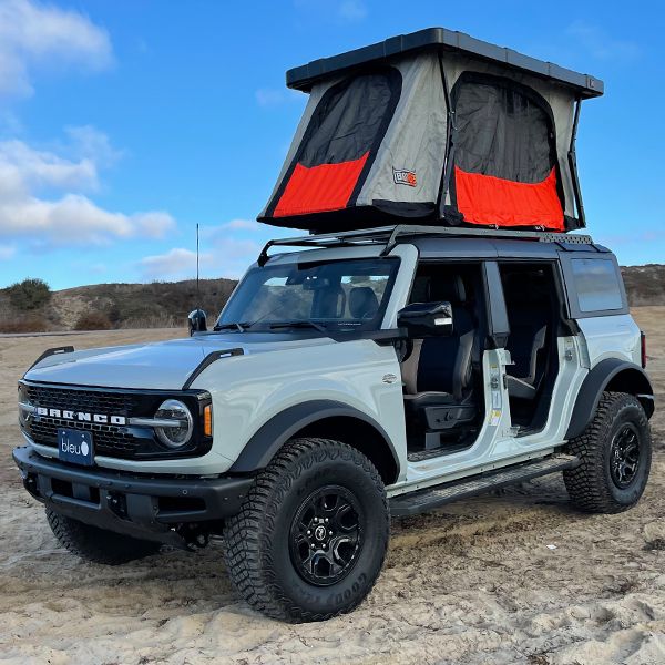 badass-tents-recon-pop-up-roof-top-tent-open-front-view-with-insect-mesh-closed-on-ford-bronco