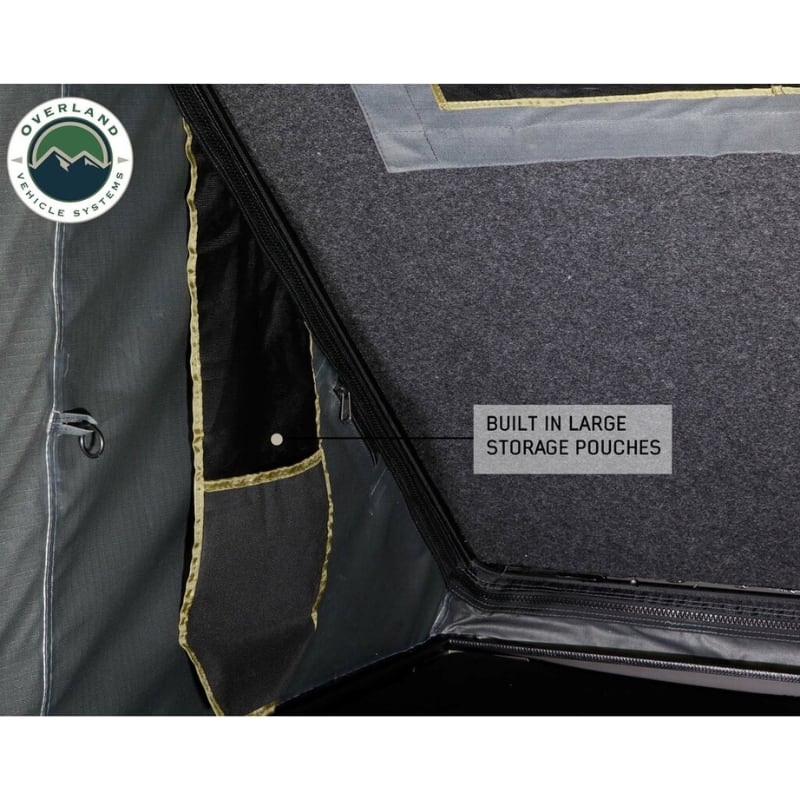 overland-vehicle-systems-mamba-hard-shell-roof-top-tent-open-interior-view-storage-pouch-description